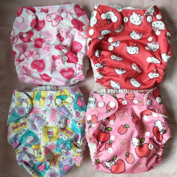 Sunbaby Hello Kitty Sanrio one-size pocket cloth diapers (lot of 8)